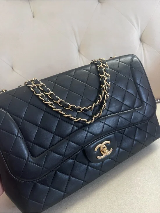 Chanel Quilted Lambskin Mademoiselle Chic Flap Jumbo Size Black Gold hardware