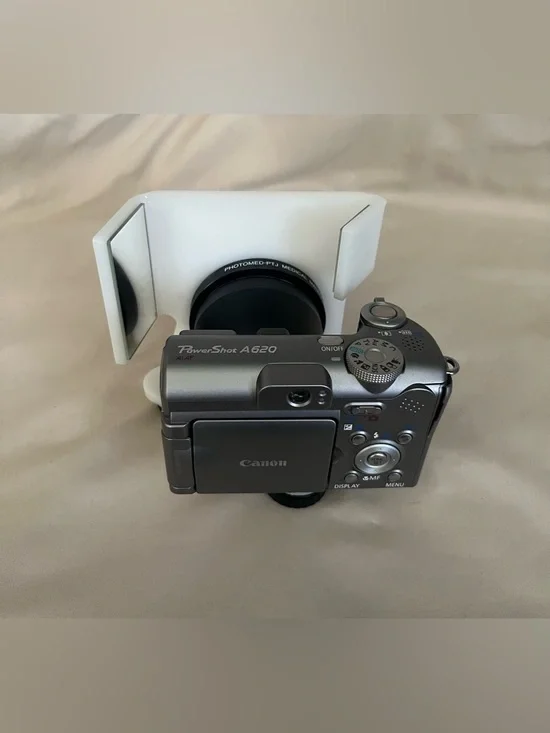 Canon PowerShot A620 digital camera with Photomed dental photography attachment