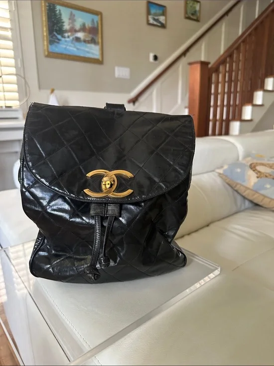CHANEL Black Quilted Leather Backpack with Gold CC Turn Lock