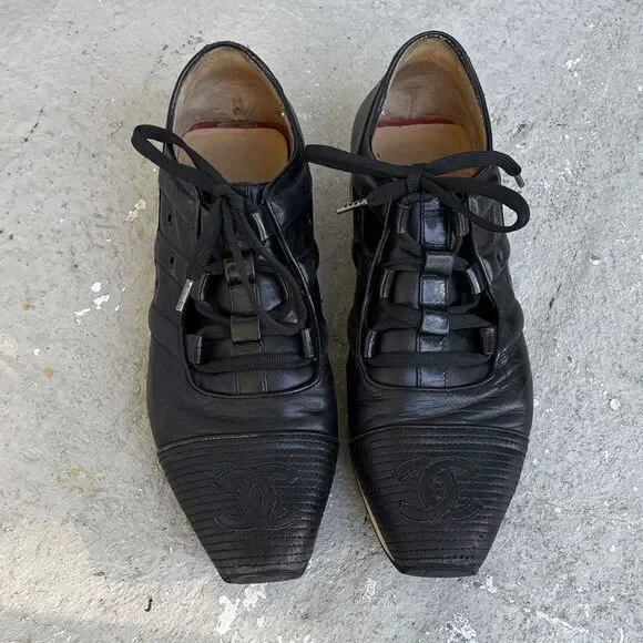 Vintage Chanel lace up sneakers