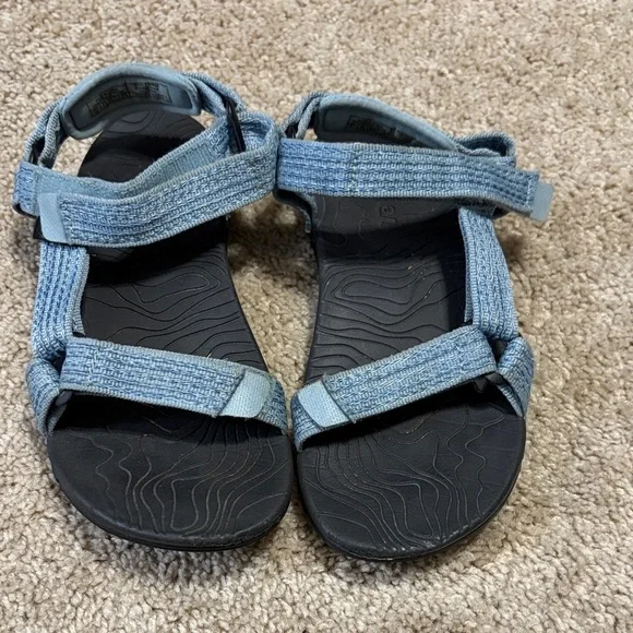 Teva Hurricane XLT2 sandals in a light blue color. Size 2