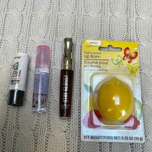 New Unused Lip gloss/balms lot of 4. Vanilla strawberry burst cocoa kiss lemon