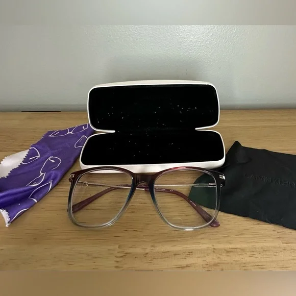 Calvin Klein women’s eyeglasses with matching hard case and 2‎ cleaning cloths