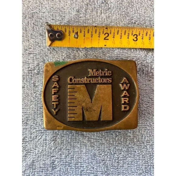 Vintage Metric Constructors Belt Buckle