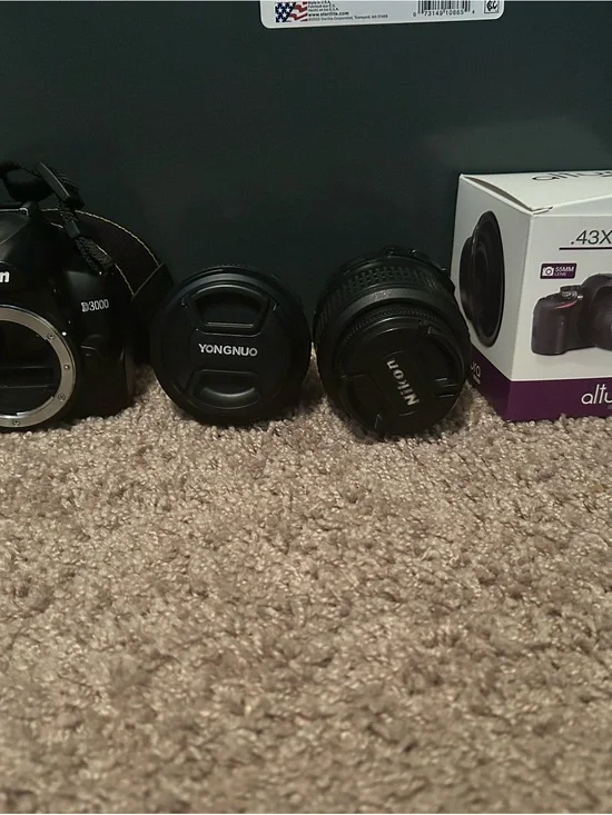 Nikon Black DSLR Body with Black Nikon and Yongnuo Lenses