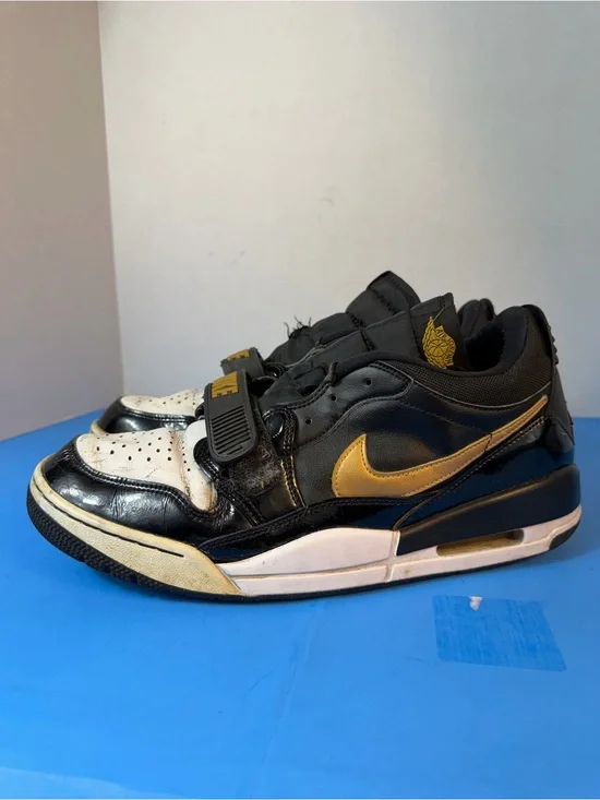 Jordan Black, White & Gold Strap Sneakers