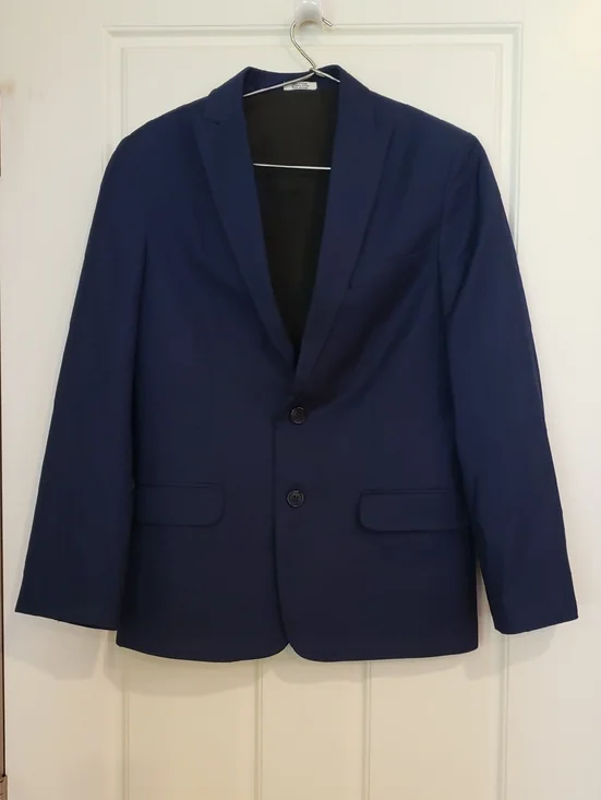 Calvin Klein Boys Blue Suit Set. Jacket size 12 Regular. Slacks size 10 Regular.