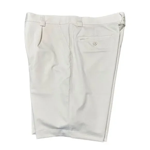 Under Armour men’s shorts waist 38 cream color.   A472