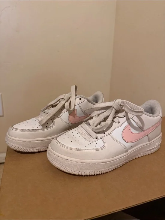 Nike White Low-Top Sneakers with Pink Swoosh