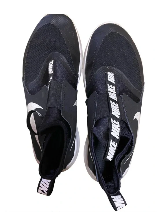 Nike • Flex Runner • Black and White Slip-On Sneakers