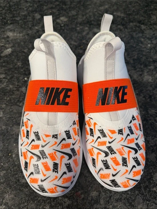 Nike White, Orange & Black Elastic-Strike Slip-Ons
