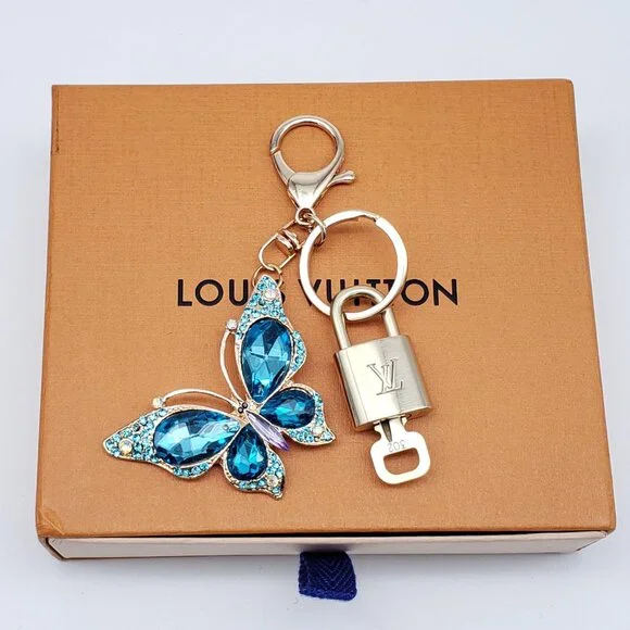Authentic Louis Vuitton Gold Lock & Box w/ Unbranded Butterfly Bagcharm
