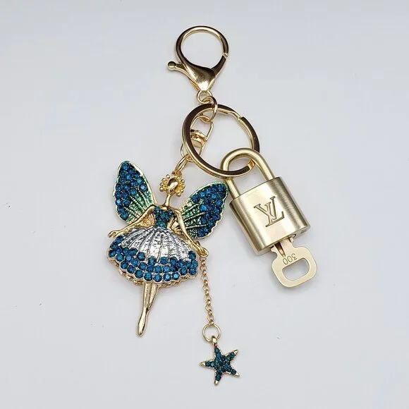 Authentic Louis Vuitton Lock & Key with Unbranded Fairy Charm, Keychain