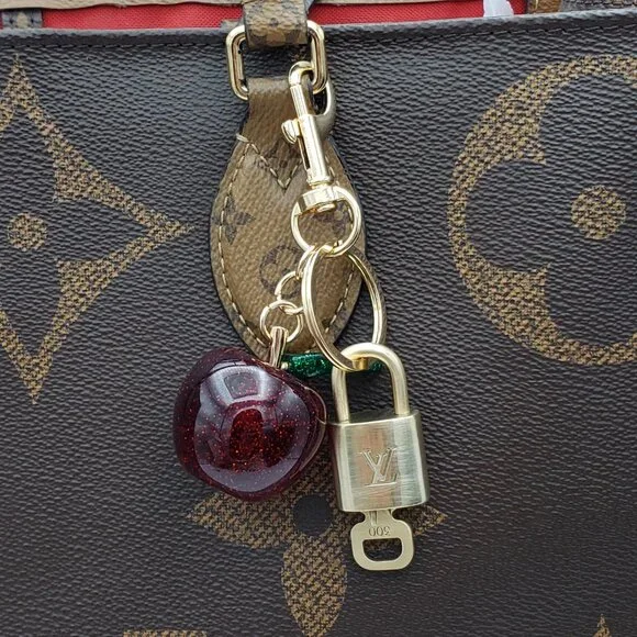 Louis Vuitton Authentic Gold Lock 🔒 Unbranded Apple Keychain Charm for Bags