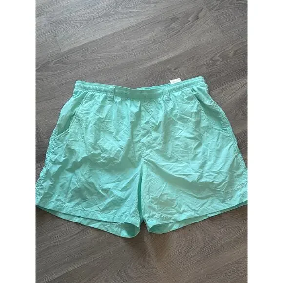 Columbia size large teal swim trunks