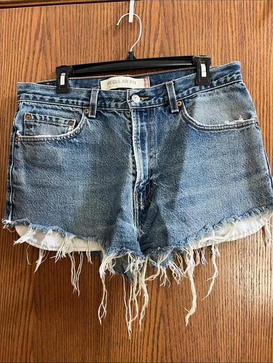 Levi's Medium Blue Distressed Cutoff Denim Shorts