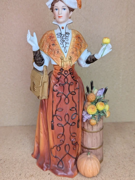 Avon Orange and Gold Autumn Lady Figurine