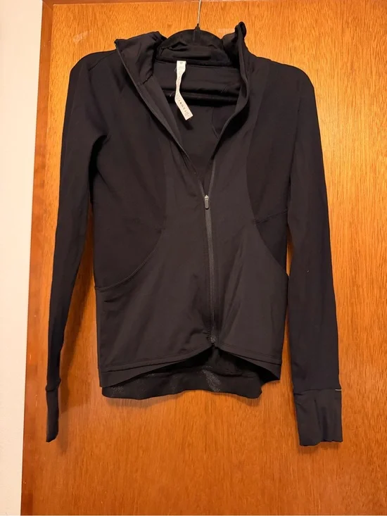 Lululemon athletic running style jacket with built in hood