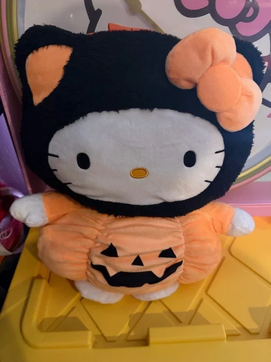Sanrio Hello Kitty Plush in Black Hood and Orange Pumpkin Outfit