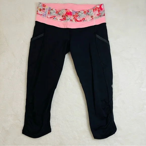 lululemon Cropped Black and Pink Floral Waistband Leggings