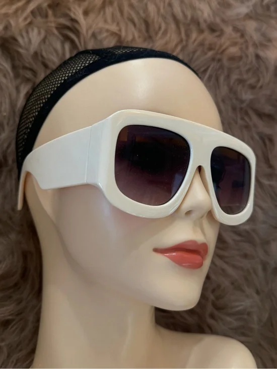 Futuristic sunglasses cream white