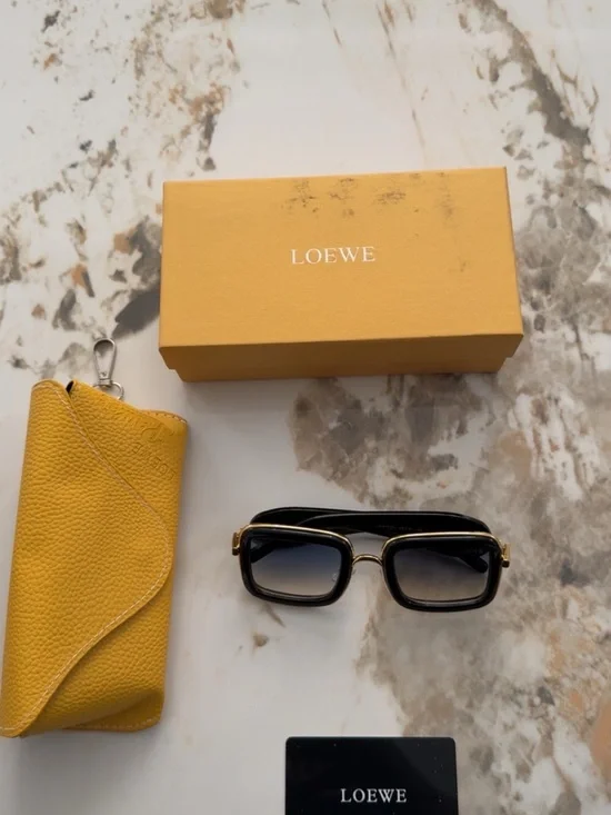 Loewe Black Sunglasses with Gold Accents and Gradient Lenses
