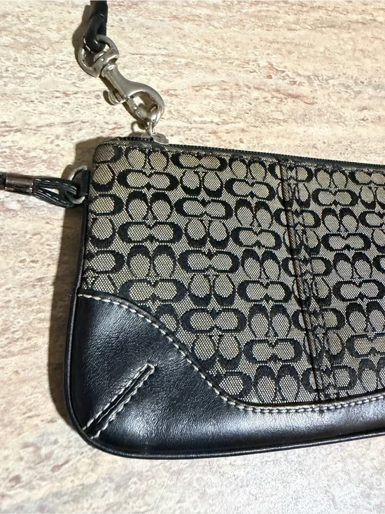 Coach Signature Canvas Wristlet with leather trim and handle