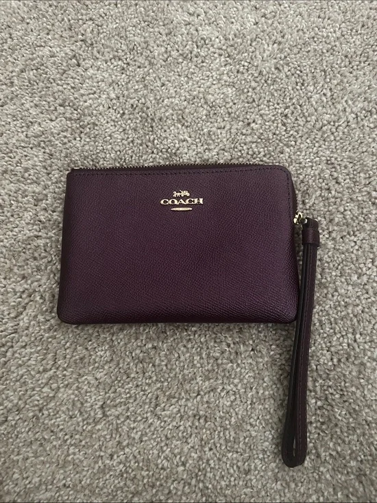 COACH Pebbled Leather Wristlet in Plum with Gold Hardware