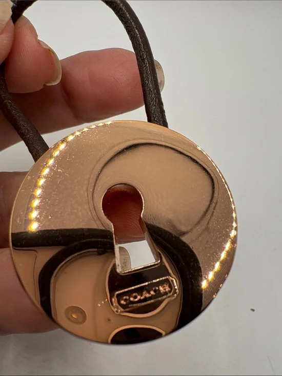Coach Rose Gold Tone and Brown Leather Strap Charm keychain