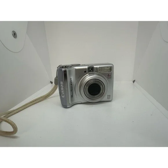 Canon PowerShot A550 7.1MP Digital Camera FOR PARTS CORRODED