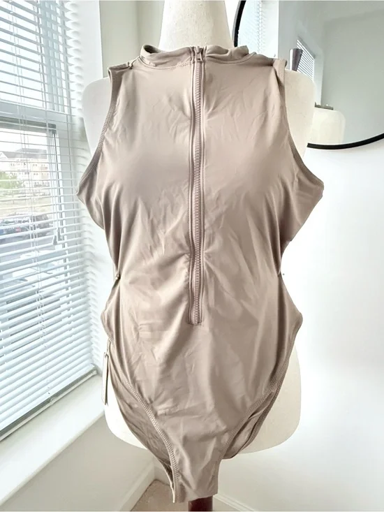 SKIMS Sleeveless Front-Zip Bathingsuit in color Desert