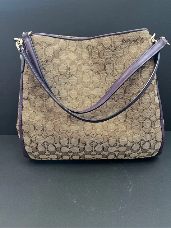 Coach Brown Signature Jacquard Shoulder Bag with Purple Trim. 3 compartments.GUC