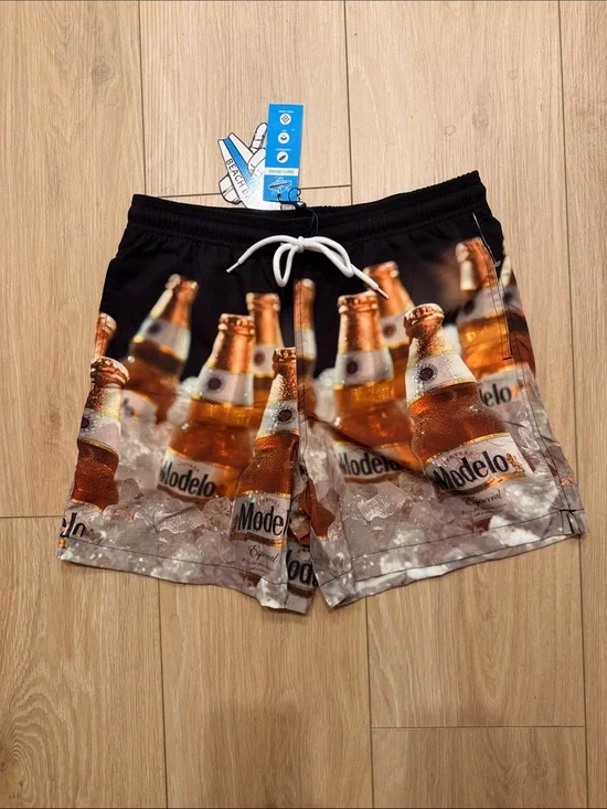 Modelo Bottle Print Men’s Swim Trunks in Black and Amber