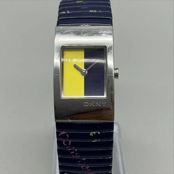 DKNY Womens Watch 19mm Silver Tone Multicolor Dial Blue Stretch Band New Battery