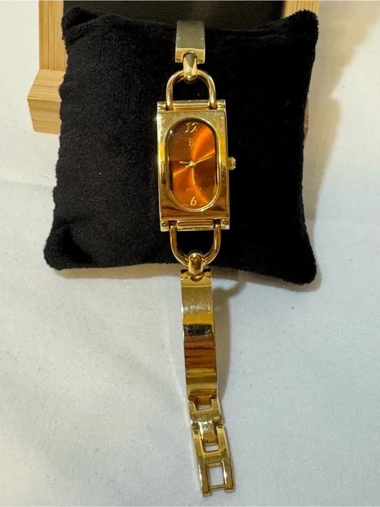 Etienne Aigner Gold Tone Bracelet Watch with Amber Dial