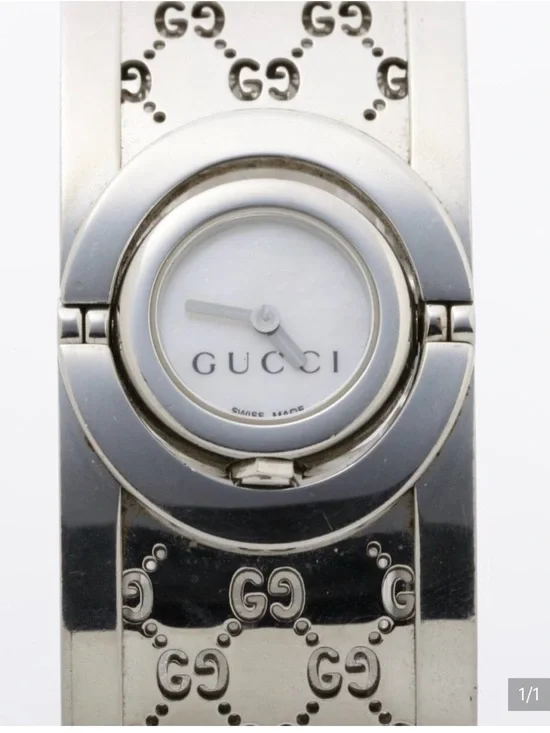 Gucci Silver-Tone GG Engraved Bangle Watch with White Dial