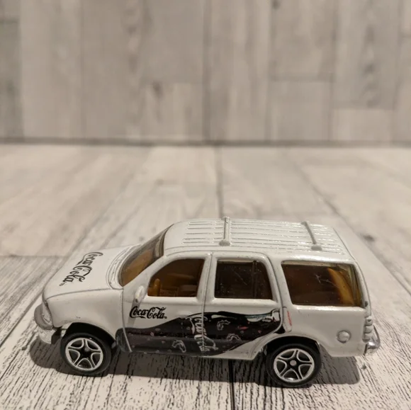 Coca Cola White Die-Cast SUV Toy with Black Graphics