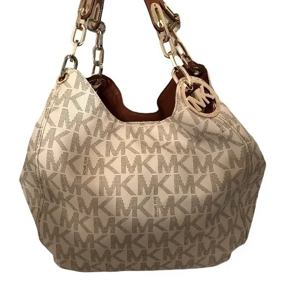 Michael kors white monogram triple compartment bag