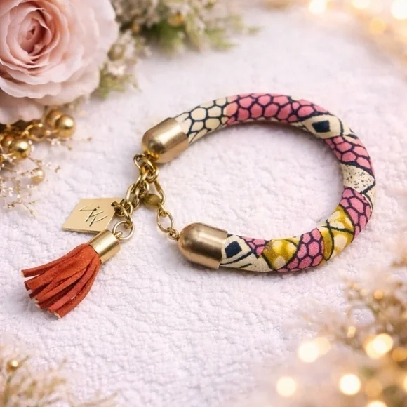 Pink and Gold Bracelet with Tassel Charm