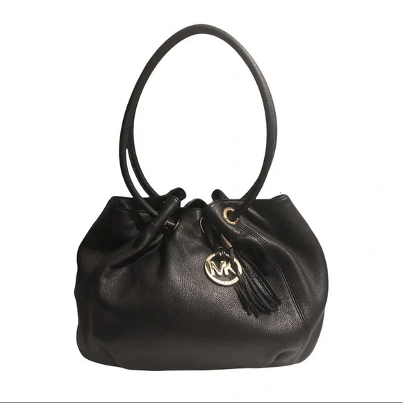Michael kors black leather ringed tassel bag