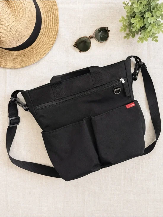 Black Skip Hop Canvas Diaper Bag and matching diaper changing pad clutch