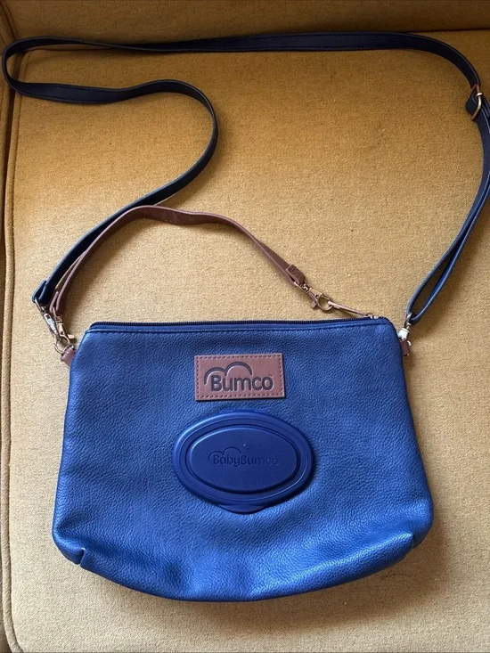 Baby Bumco Vegan Leather Diaper Crossbody/Clutch lightweight baby travel bag.