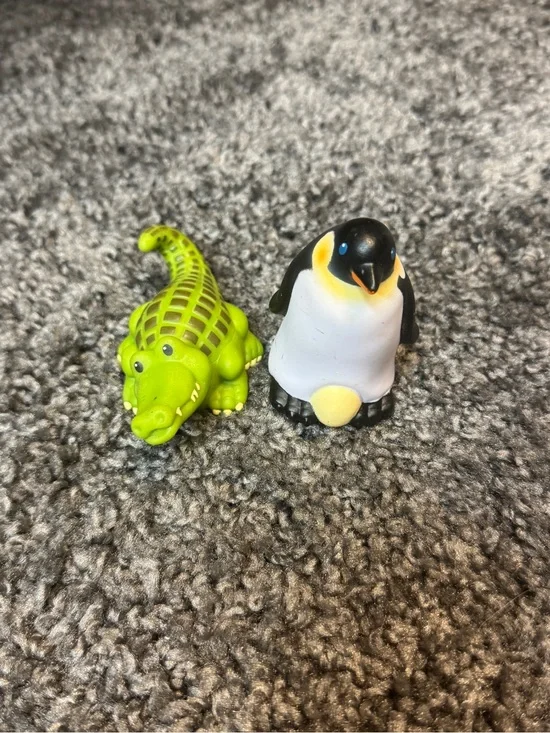 Little people penguin and alligator