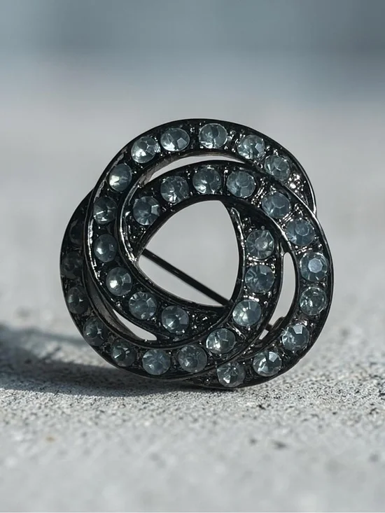 Luminous Ice Blue Crystal Gunmetal Knot Brooch Pin