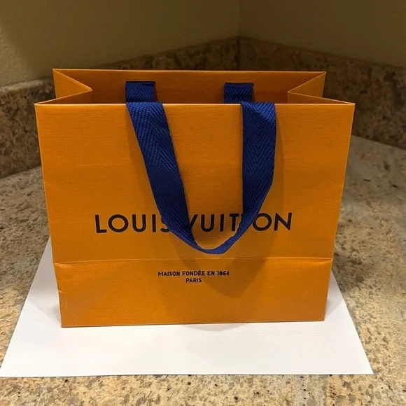 Louis Vuitton Bold Orange Bag with Blue Handles