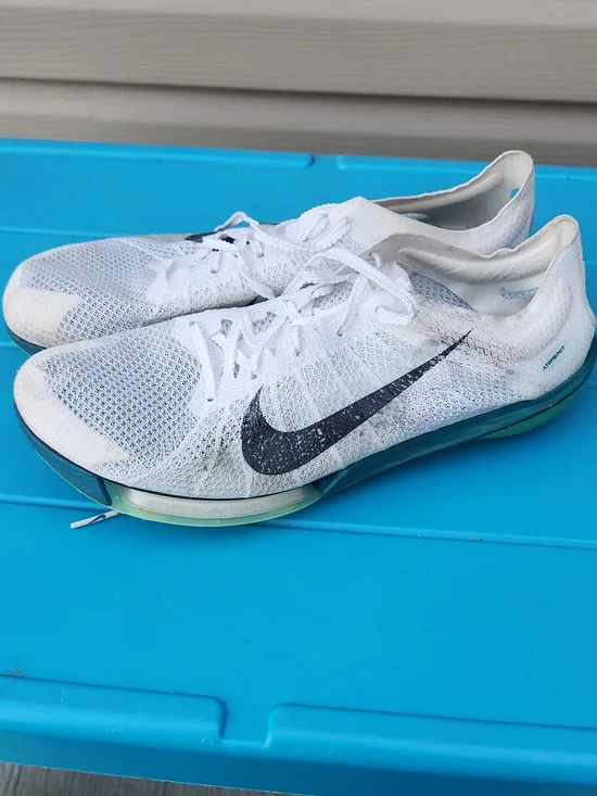 Nike Men’s White Track And Field Shoes with Black Swoosh and Green Sole W Spikes