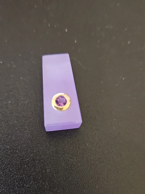 Elegant Purple Pendant with Gold Accent
