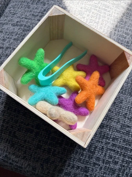 Lovevery felt stars and tweezers