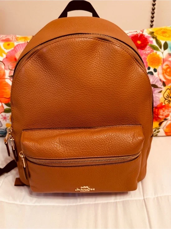 Coach Charlie medium size pebble leather backpack.