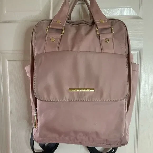 Steve Madden Nylon blush pink backpack with black embroidery back straps.
